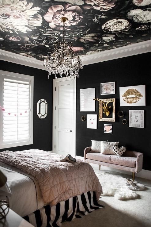 a photo of a bedroom with painted ceiling